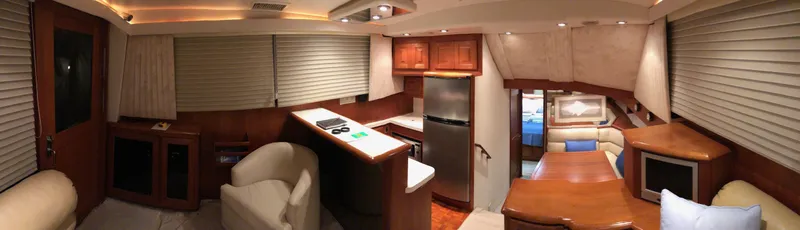 Slide: The Image of Luxurious interior of a 1990 Viking 38 Convertible yacht with modern amenities. - 18