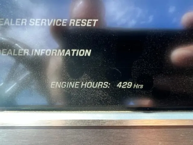 Slide: The Image of 2019 MasterCraft XT25 engine hours display showing 429 hours. - 21