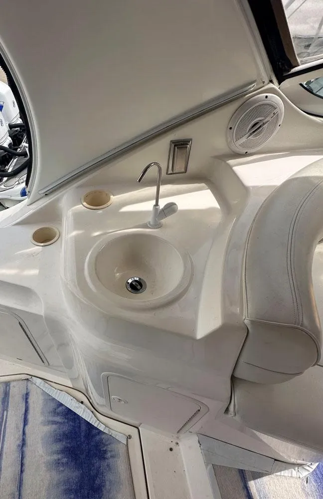 Slide: The Image of 2002 Cruisers Yachts 3372 Express cockpit sink and counter area. - 16
