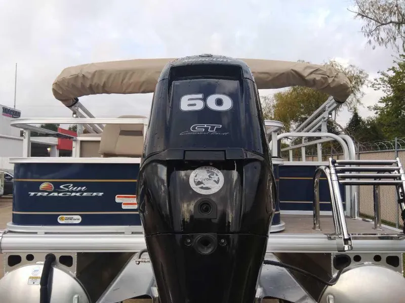 Slide: The Image of 2024 Sun Tracker Bass Buggy 18 DLX pontoon boat with 60 HP engine. - 5