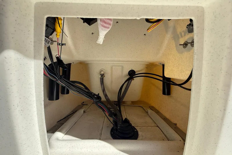 Slide: The Image of 2024 Mako Pro Skiff 13 CC interior wiring and compartment view. - 15