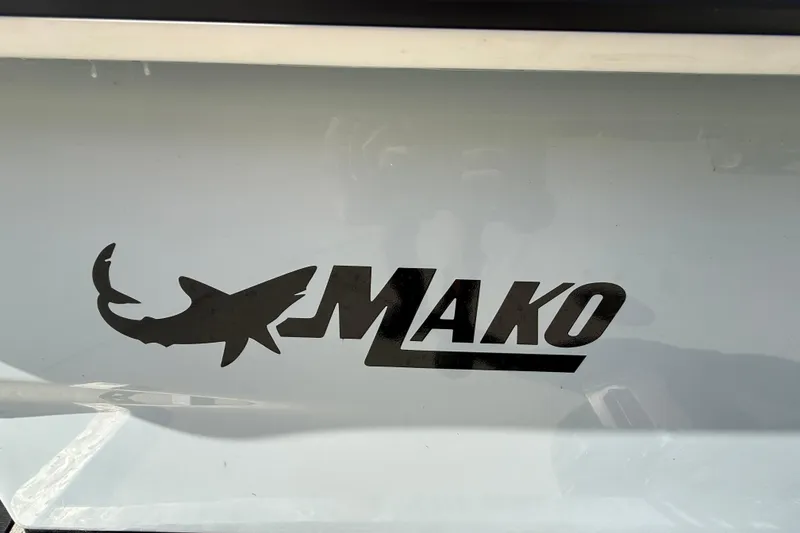 Slide: The Image of 2024 Mako Pro Skiff 13 CC logo on boat hull. - 17