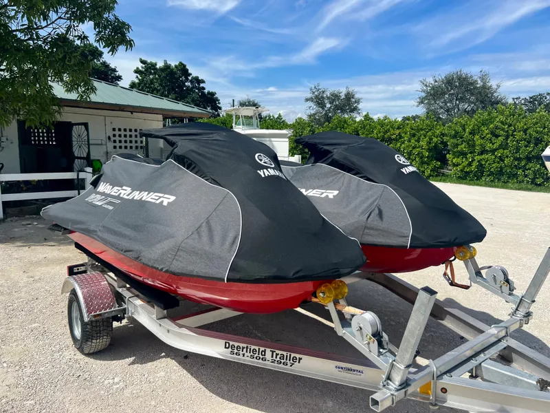 Slide: The Image of 2022 Yamaha WaveRunner VX Cruisers Limited on trailer with covers in sunny outdoor setting. - 18