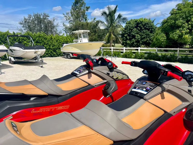 Slide: The Image of 2022 Yamaha WaveRunner VX Cruisers Limited jet skis in a sunny outdoor setting. - 7