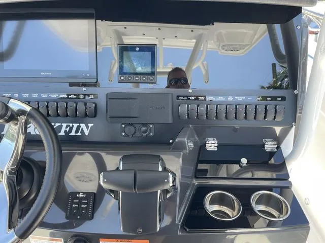 Slide: The Image of 2023 Blackfin 272CC boat dashboard with advanced controls and navigation systems. - 10