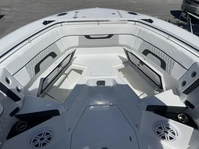 Slide: The Image of 2023 Blackfin 272CC boat interior with open storage compartments. - 14