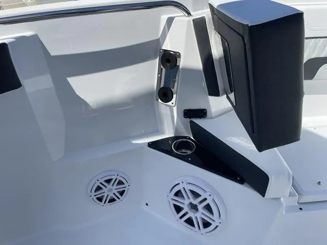 Slide: The Image of 2023 Blackfin 272CC boat interior with speakers and cup holder. - 16
