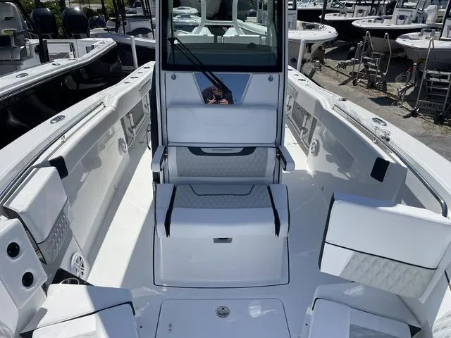 Slide: The Image of 2023 Blackfin 272CC center console boat interior with seating and storage compartments. - 19