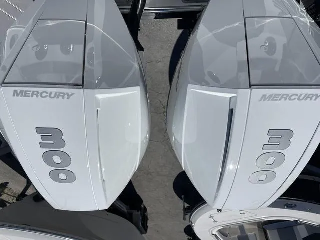 Slide: The Image of Twin Mercury 300 engines on a 2023 Blackfin 272CC boat. - 2