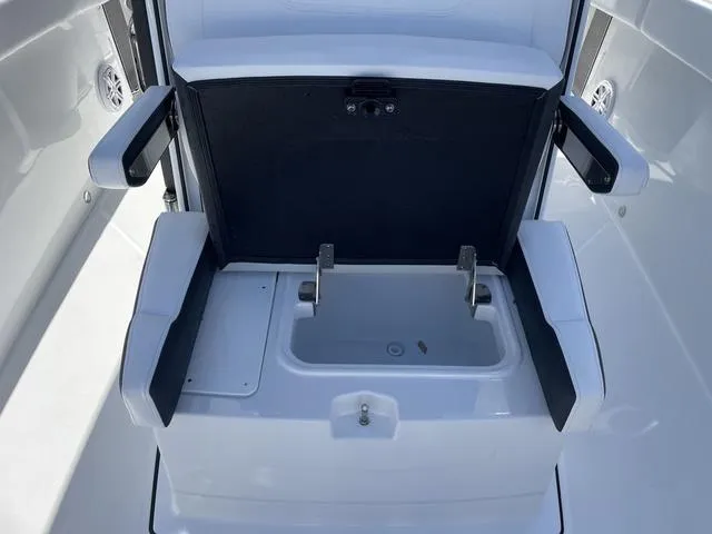 Slide: The Image of 2023 Blackfin 272CC boat seating with storage compartment. - 21