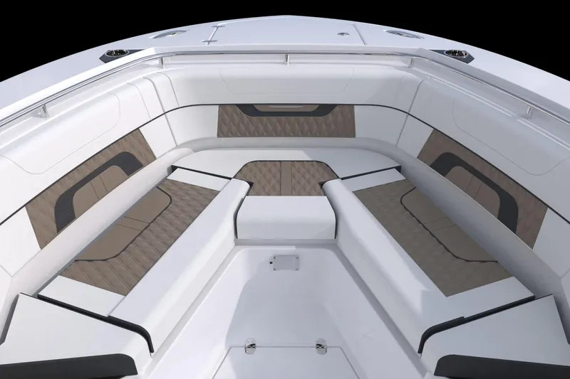 Slide: The Image of 2023 Blackfin 272CC boat interior with cushioned seating. - 49