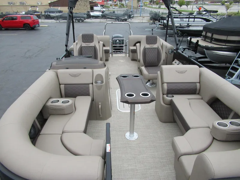 Slide: The Image of 2024 Bennington 22 LFB pontoon boat with spacious seating and cup holders. - 2