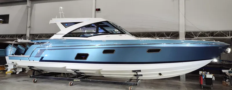 Slide: The Image of 2020 Formula 430 All Sport Crossover boat in a showroom, side view. - 0