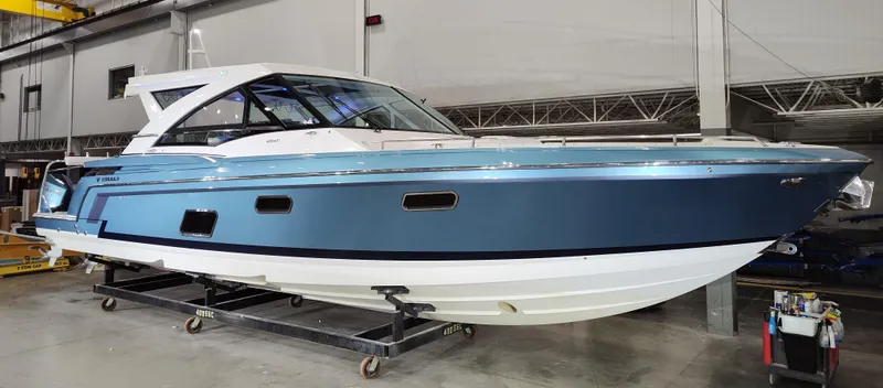 Slide: The Image of 2020 Formula 430 All Sport Crossover boat in a showroom, side view. - 1