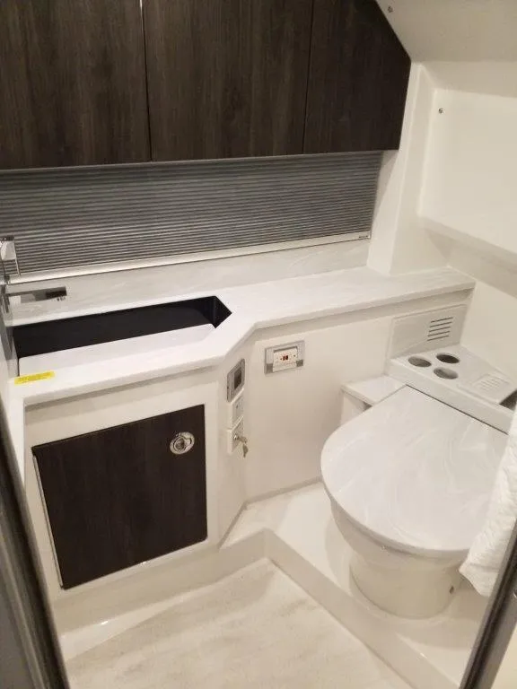Slide: The Image of Modern bathroom in 2020 Formula 430 All Sport Crossover boat with sleek fixtures. - 16