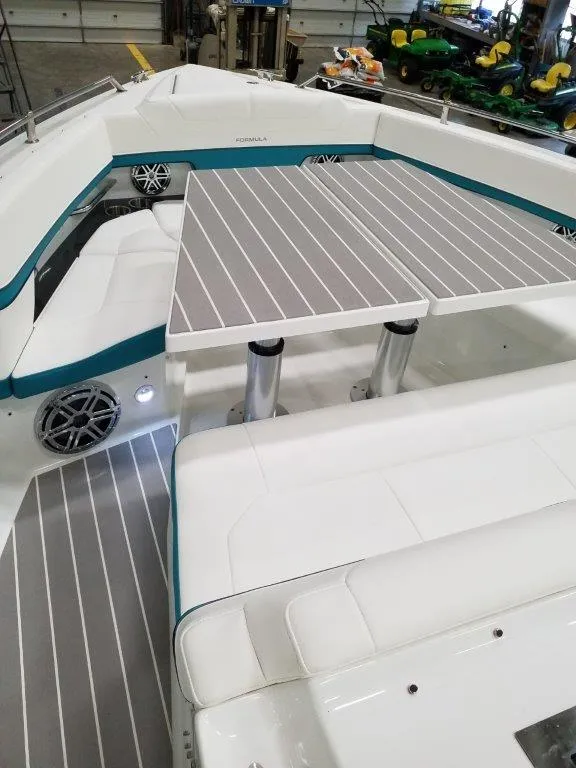 Slide: The Image of 2020 Formula 430 All Sport Crossover boat interior with seating and table. - 22