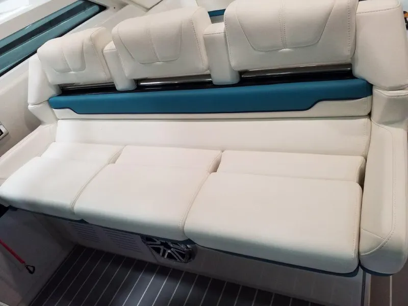 Slide: The Image of 2020 Formula 430 All Sport Crossover boat interior seating with white and blue upholstery. - 24