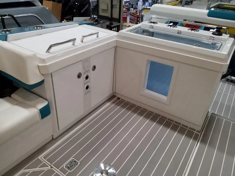 Slide: The Image of 2020 Formula 430 All Sport Crossover boat interior with storage compartments. - 32