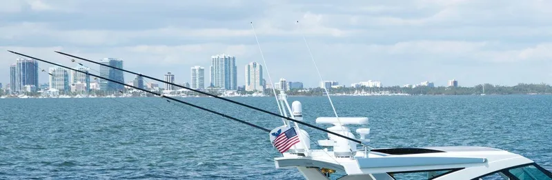 Slide: The Image of 2020 Formula 430 All Sport Crossover boat with city skyline in the background. - 33