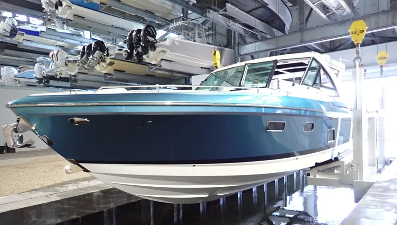 Slide: The Image of 2020 Formula 430 All Sport Crossover boat in a storage facility. - 5