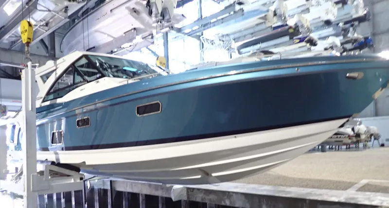 Slide: The Image of 2020 Formula 430 All Sport Crossover boat in a storage facility. - 6