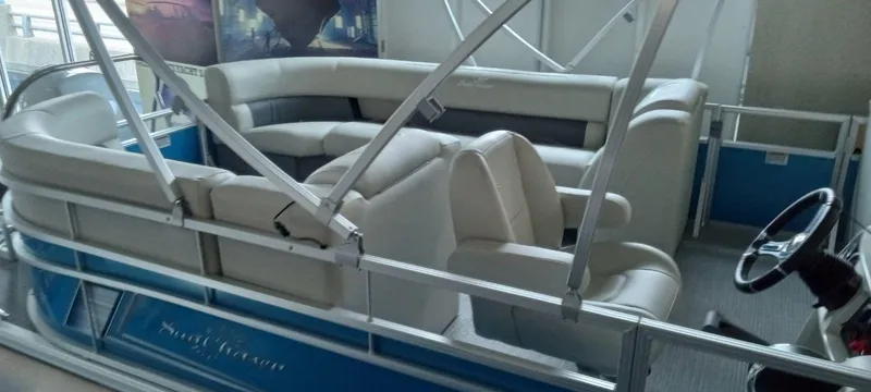 Slide: The Image of 2024 SunChaser Vista 22 LR pontoon boat with spacious seating and modern design. - 6