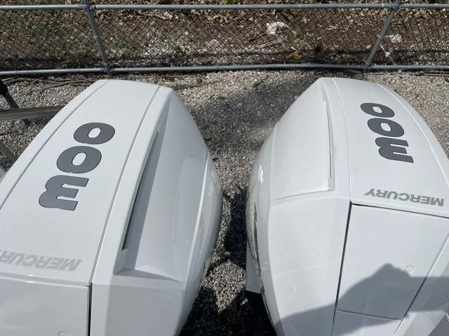 Slide: The Image of 2023 Blackfin 272CC with twin Mercury 300 outboard engines. - 3