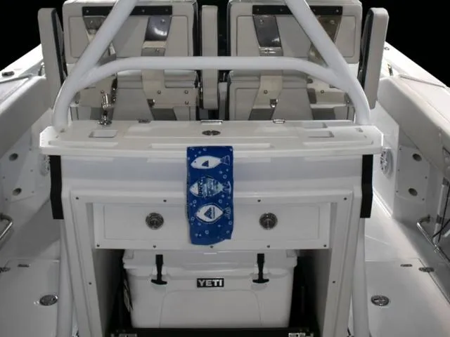 Slide: The Image of 2023 Blackfin 272CC boat interior with Yeti cooler and dual seats. - 35