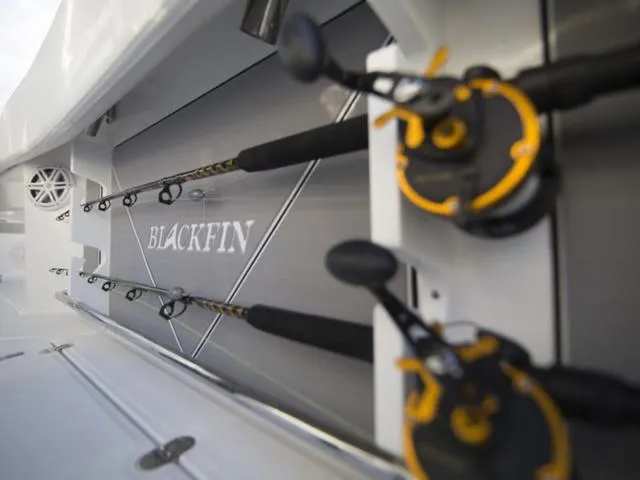Slide: The Image of 2023 Blackfin 272CC fishing rods storage compartment. - 36