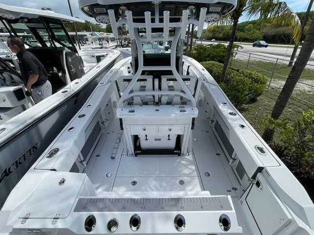 Slide: The Image of 2023 Blackfin 272CC center console boat with spacious deck and modern amenities. - 4