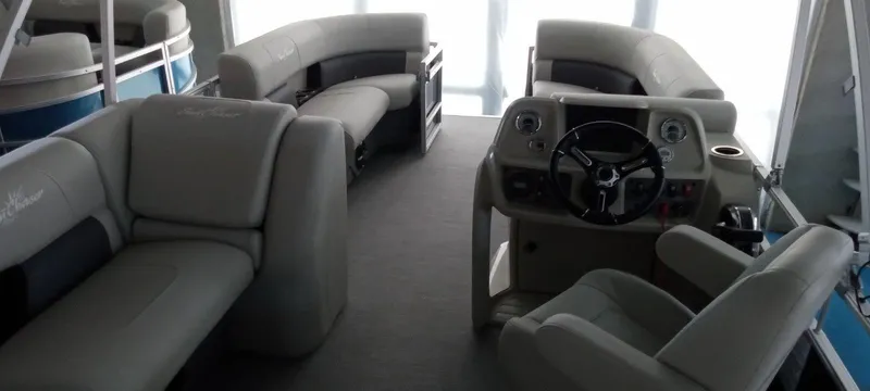 Slide: The Image of Interior of 2024 SunChaser Vista 20 CRB pontoon boat with plush seating and modern helm. - 12