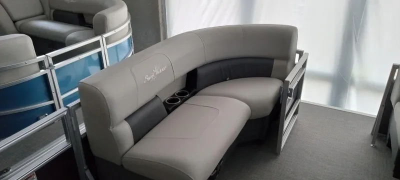 Slide: The Image of 2024 SunChaser Vista 20 CRB pontoon boat interior seating with cup holders. - 9