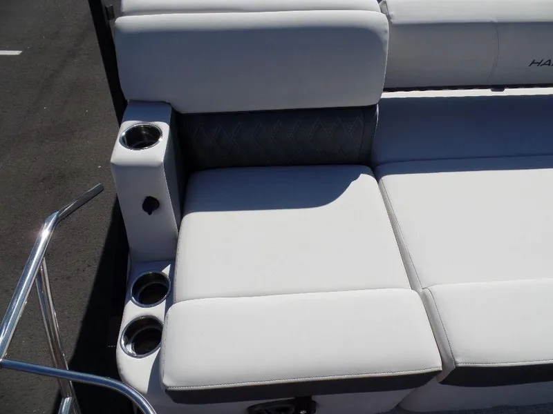 Slide: The Image of 2024 Harris Sunliner 230 boat seating with cup holders. - 16