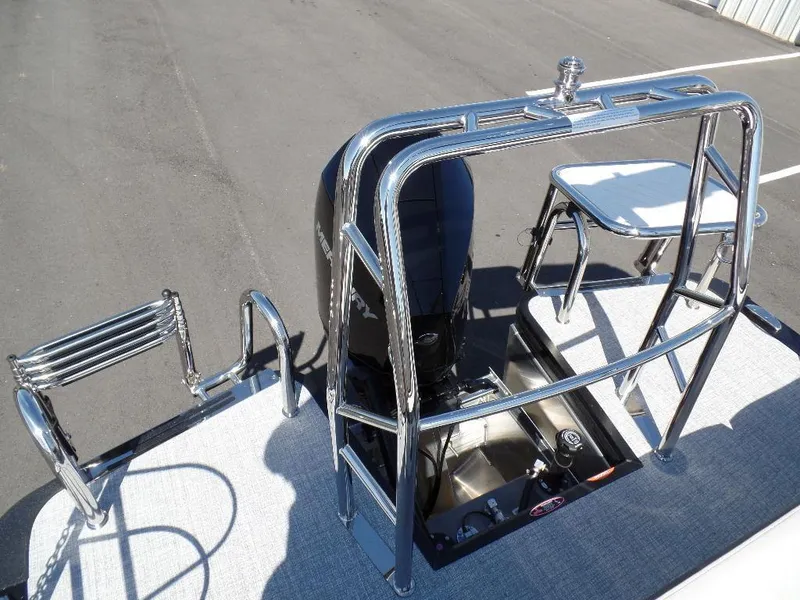 Slide: The Image of 2024 Harris Sunliner 230 boat with stainless steel ladder and engine. - 18