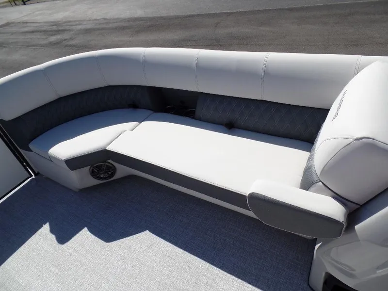 Slide: The Image of 2024 Harris Sunliner 230 boat with luxurious seating and modern design. - 4