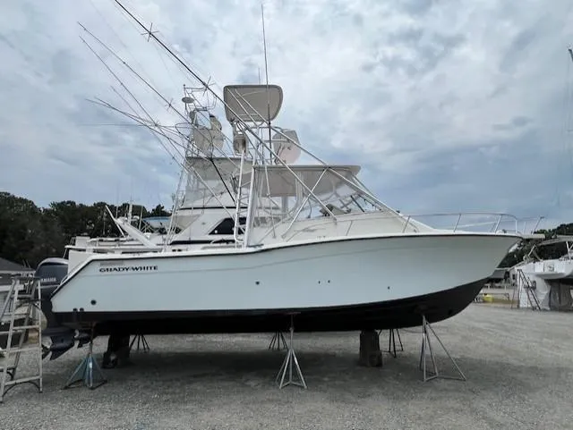 Slide: The Image of 2002 Grady-White 330 Express boat on stands, ready for maintenance. - 36