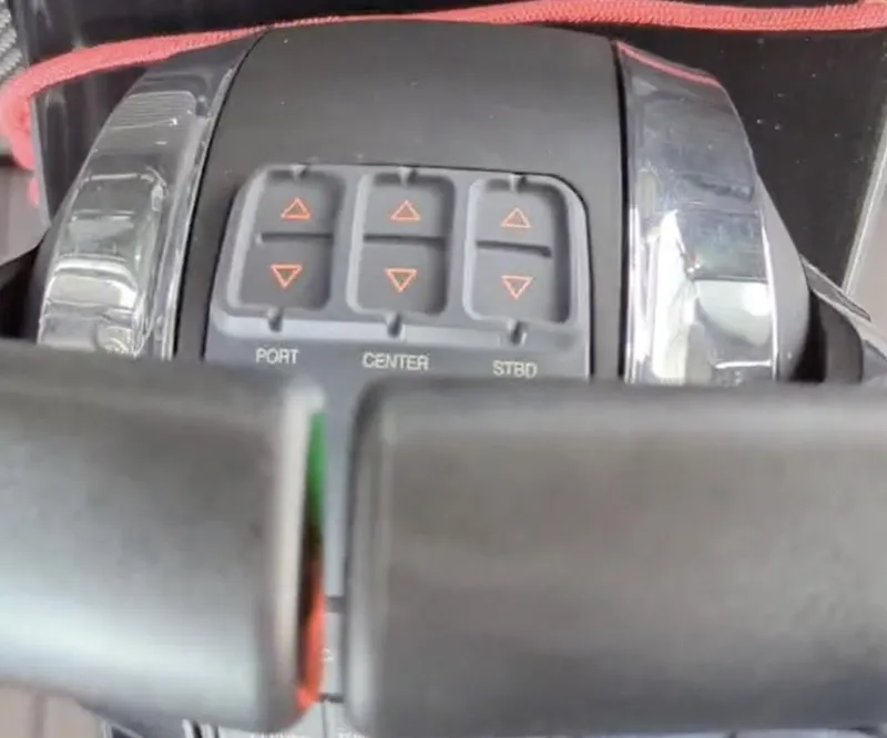 Slide: The Image of Control panel of 2020 Mystic Powerboats M4200, featuring port, center, and starboard buttons. - 18