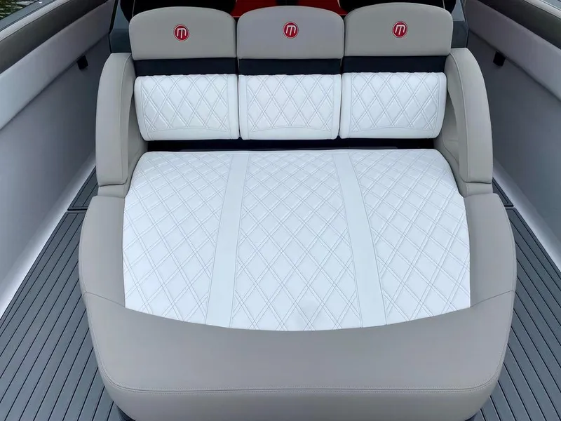 Slide: The Image of Luxurious seating on 2020 Mystic Powerboats M4200 with diamond-stitched upholstery. - 28