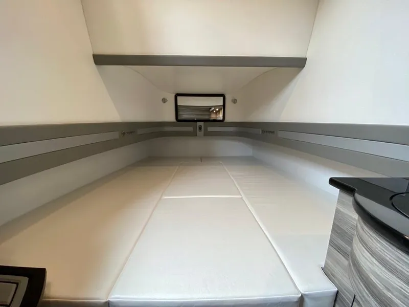 Slide: The Image of Interior cabin of 2020 Mystic Powerboats M4200, featuring sleek, modern design and comfortable seating. - 40