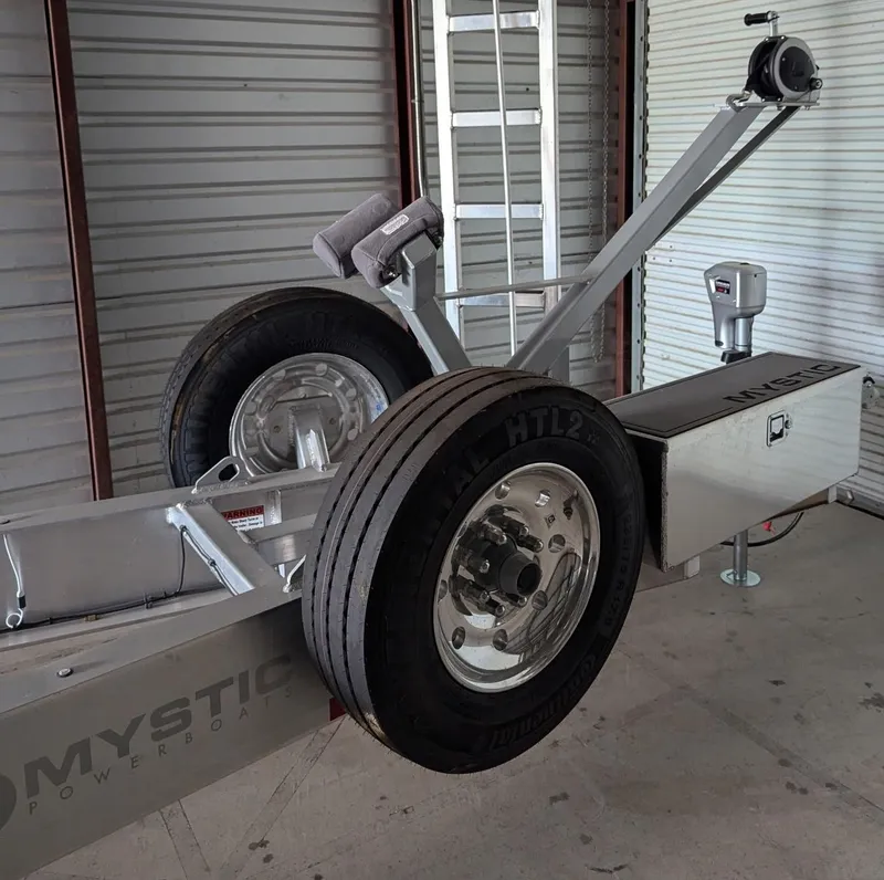 Slide: The Image of Trailer for 2020 Mystic Powerboats M4200 in storage facility. - 46