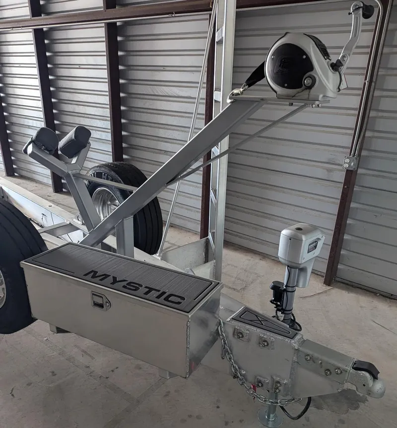 Slide: The Image of Trailer for 2020 Mystic Powerboats M4200, featuring sturdy construction and branded storage box. - 47