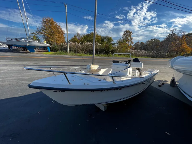 The Image of 2002 Key West 1720 Center Console boat in parking lot. - 0