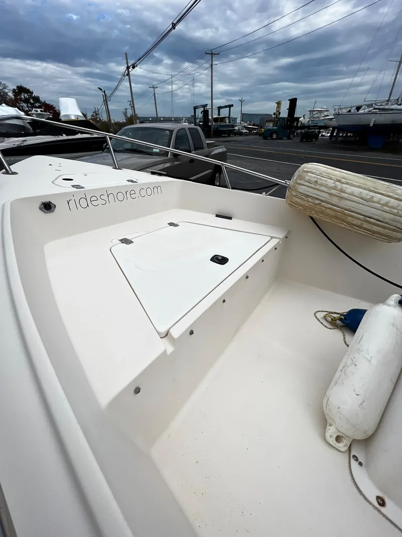 Slide: The Image of Key West 1720 Center Console boat, 2002 model, docked at harbor. - 16
