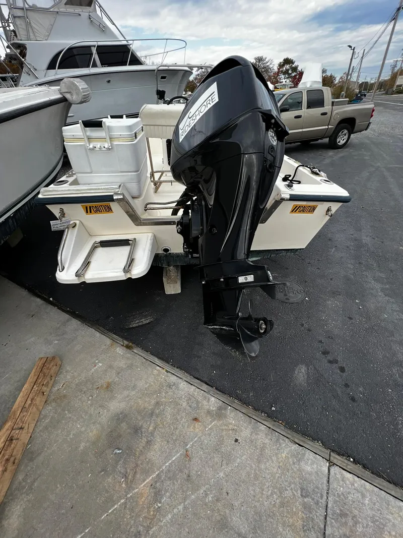 Slide: The Image of 2002 Key West 1720 Center Console with outboard motor. - 5
