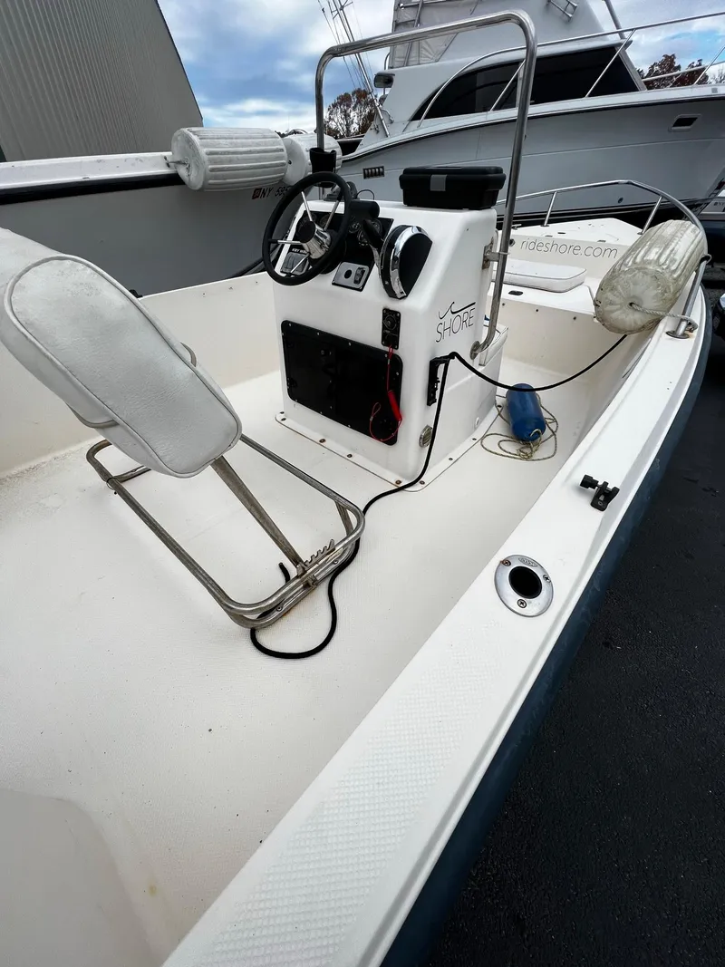 Slide: The Image of 2002 Key West 1720 Center Console boat interior view. - 6