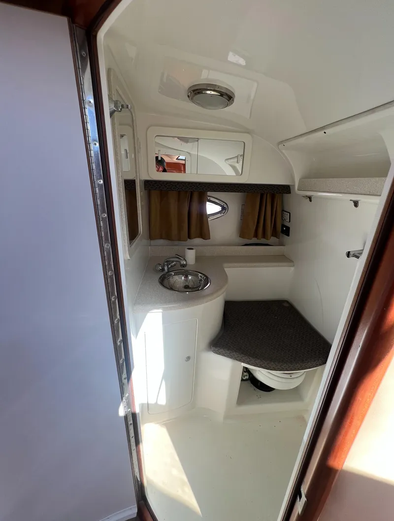 Slide: The Image of 2003 Cobalt 360 boat interior bathroom with sink and toilet - 36