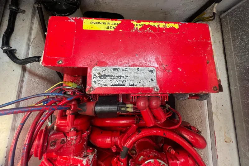 Slide: The Image of Red engine compartment of a 2003 Cobalt 360 boat. - 39