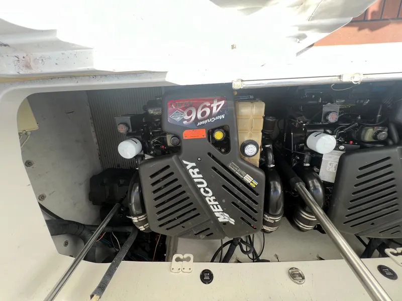 Slide: The Image of 2003 Cobalt 360 boat engine compartment with twin Mercury 496 engines. - 43