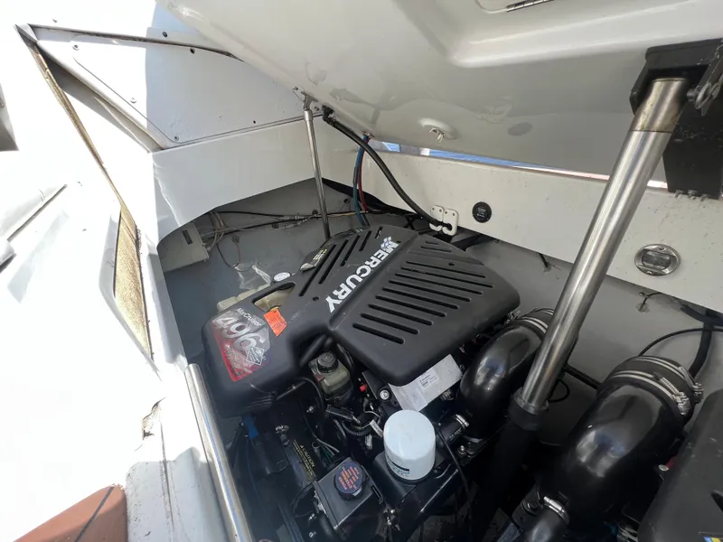 Slide: The Image of Engine compartment of a 2003 Cobalt 360 boat with a Mercury engine. - 46