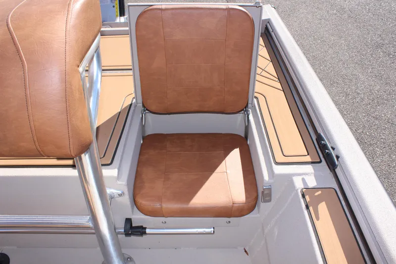 Slide: The Image of 2024 Avid ROGUE boat with brown leather seating. - 11
